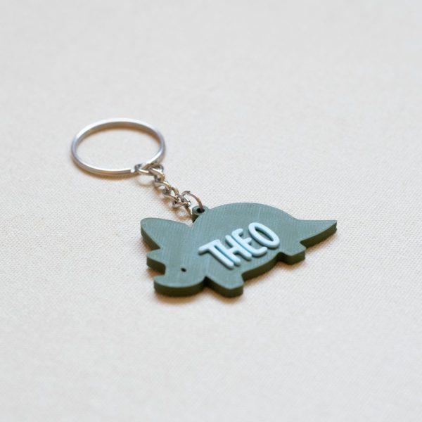Personaliziran obesek za ključe dinozaver z imenom